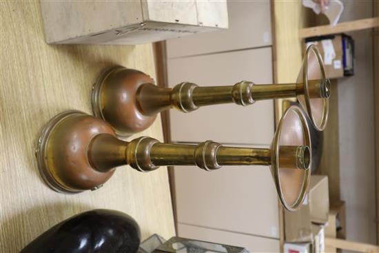 A pair of French brass ecclesiastical candlesticks, height 51cm